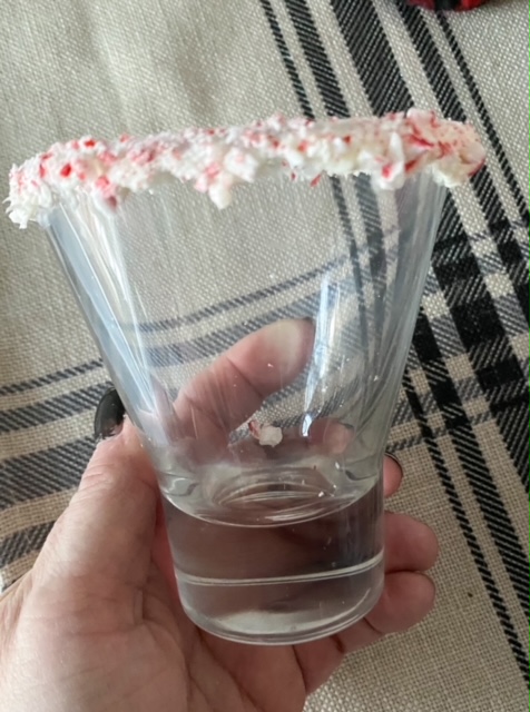 peppermint on rim of glass