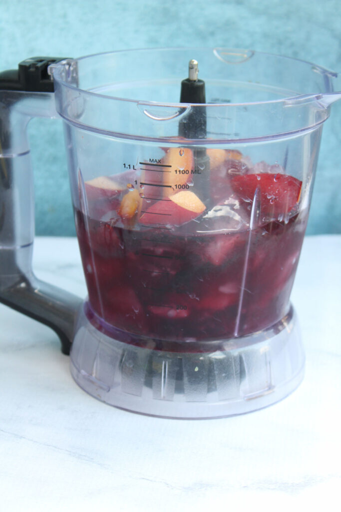 pitcher with blueberry plum wine slushies