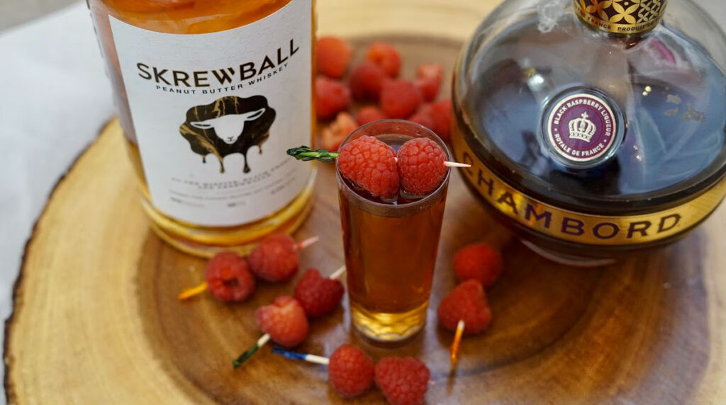 close up of Peanut Butter & Jelly Shots with Skrewball Whiskey