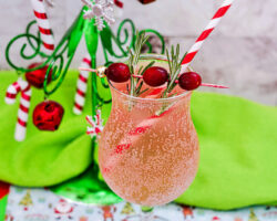 Christmas spritzer with straw on counter