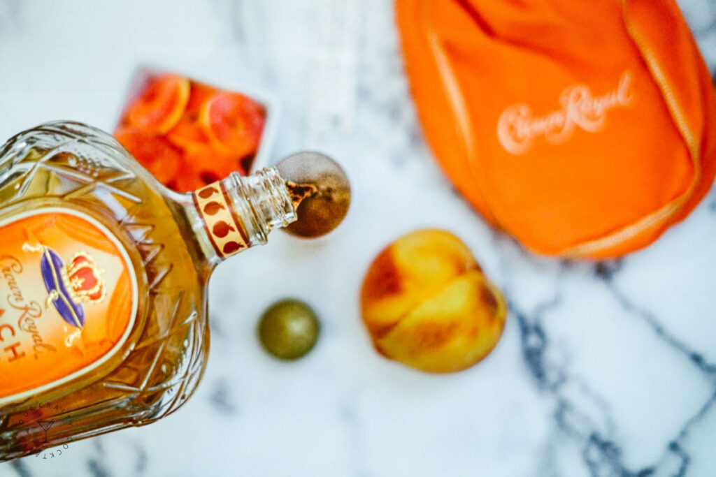 filling glass with crown royal peach